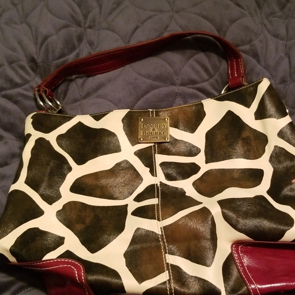 Print purse  like new  gently  used some flaws  on